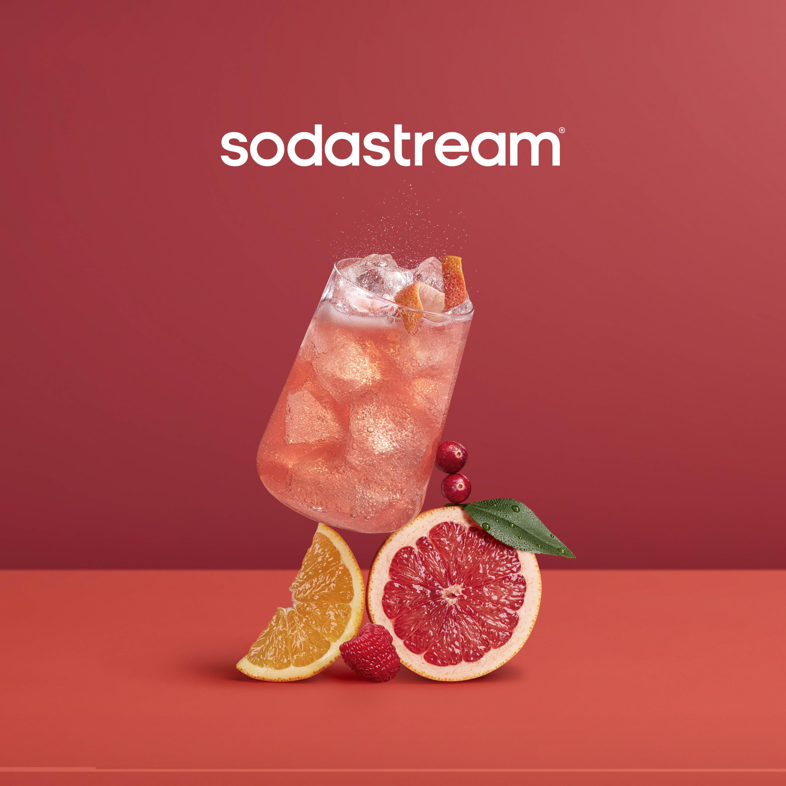 Sodastream Pink Grapefruit Zero Calorie drink pour into glass, showcasing flavorful sparkling water.