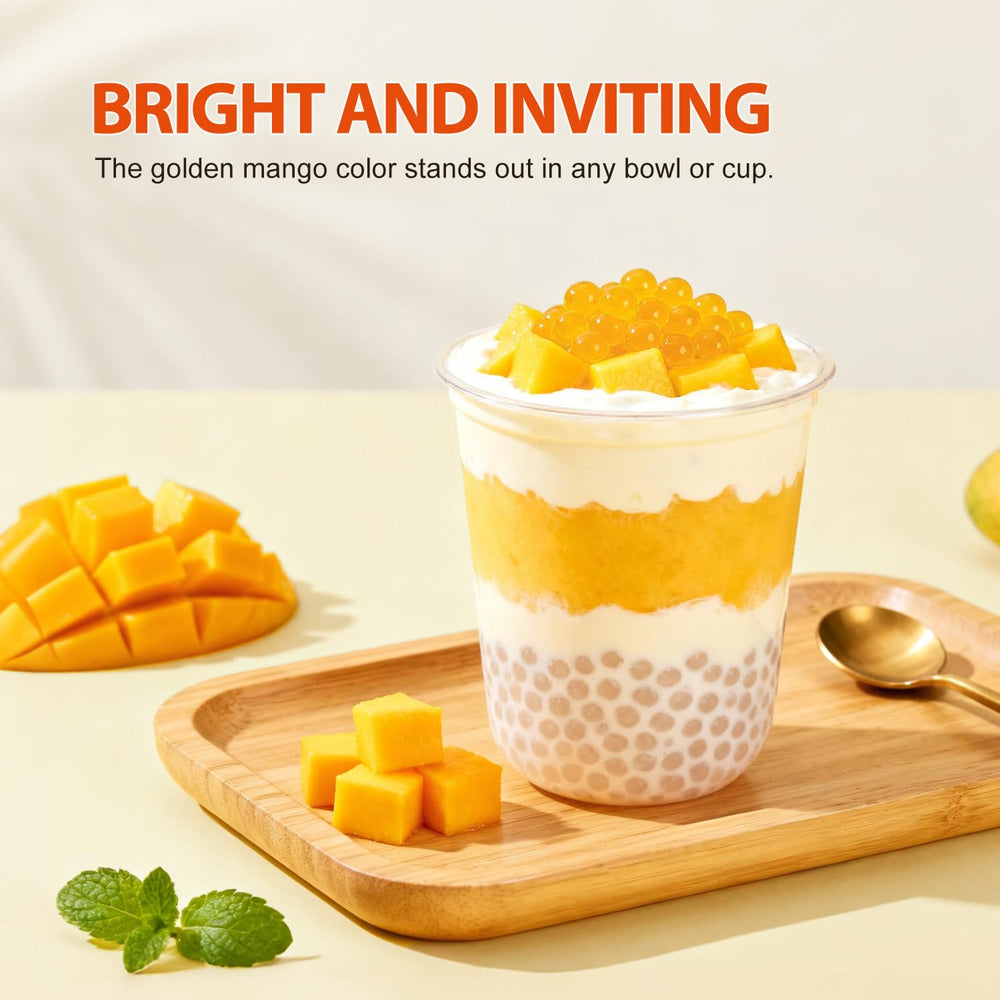 Soeos bubble tea idea with vibrant strawberries and mango pearls pouring into a cup