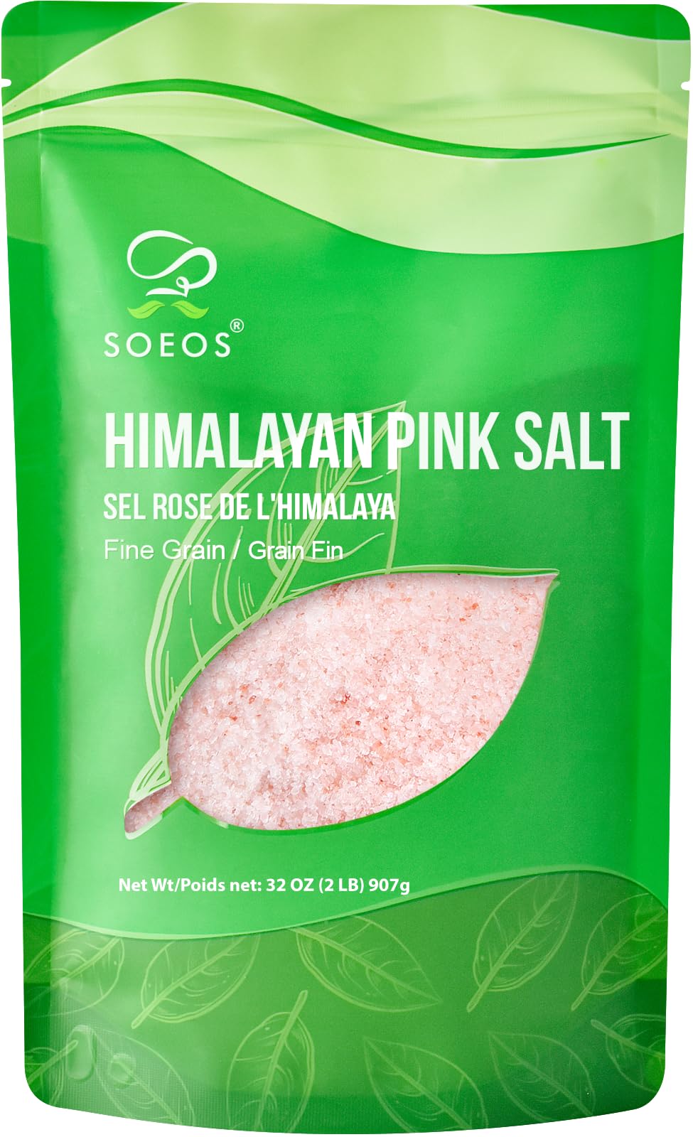Soeos Himalayan Pink Salt crystals on measuring spoon for precise seasoning.