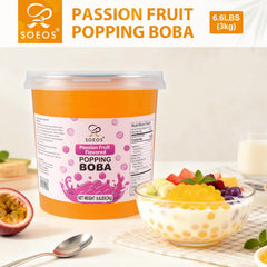 Pouring Soeos passion fruit popping boba into tea for bright color
