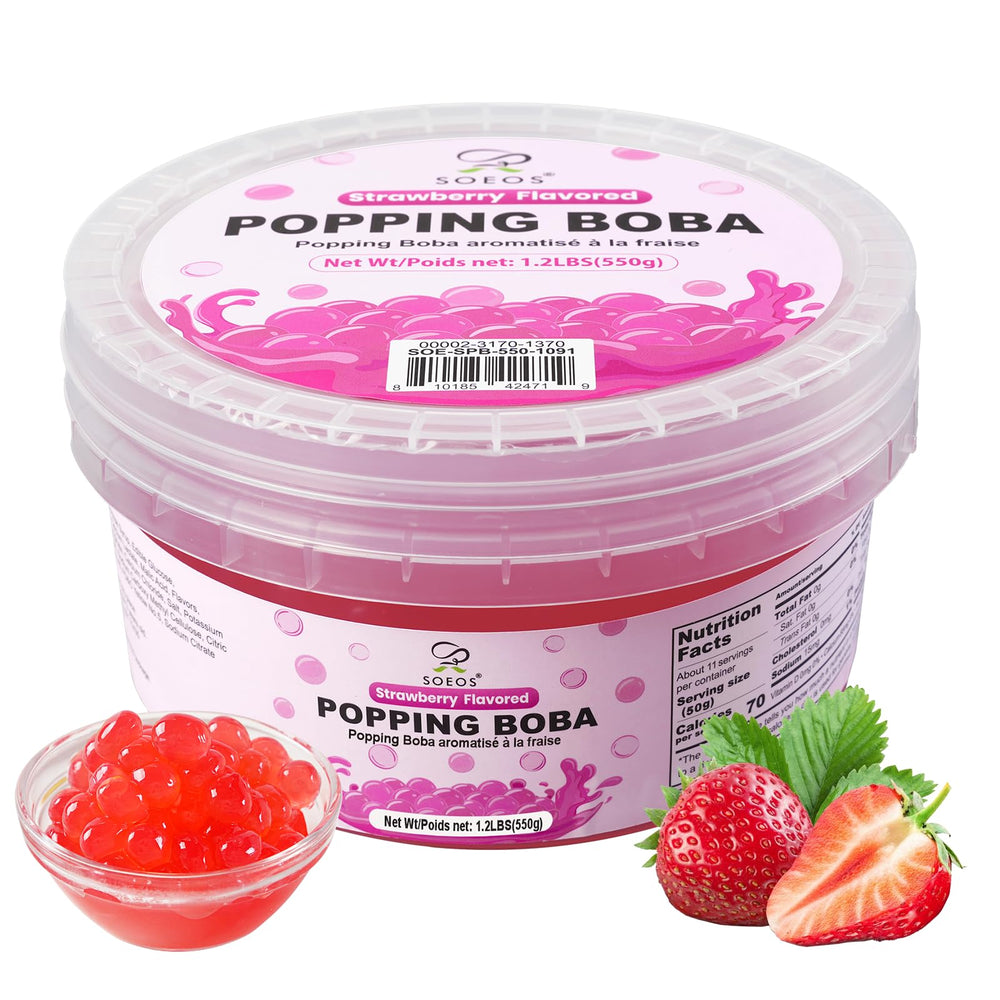 Soeos strawberry popping boba close-up revealing juicy strawberry filling for bubble tea