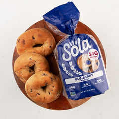 Sola Blu-Berry bagels blueberry swirl highlights vibrant flavor and texture.