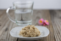 Solo Therapy slippery elm tea in cup reveals mild earthy brew for comforting moments.