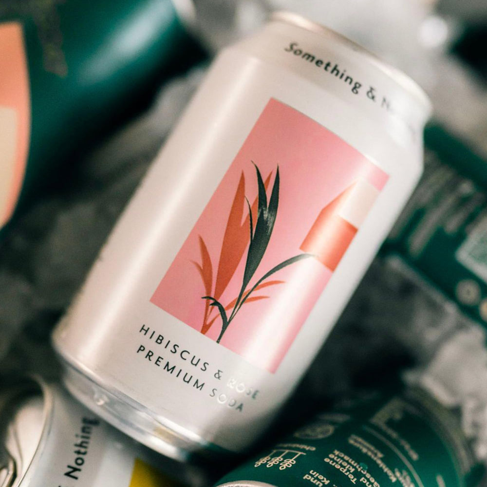 Something & Nothing hibiscus-rose sparkling water eco-packaging, fully recyclable cans.