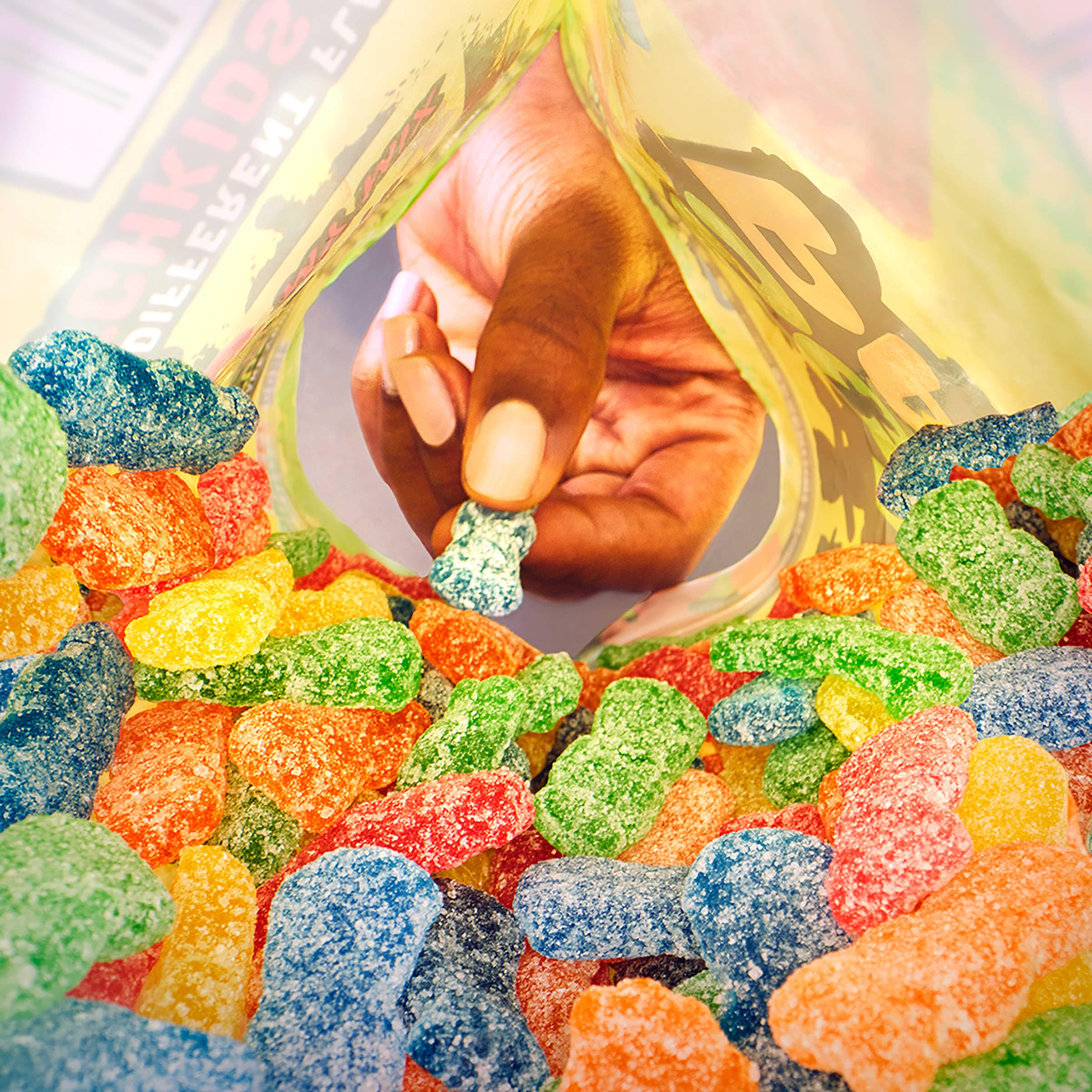 Desk drawer snack option featuring Sour Patch Kids for quick energy.