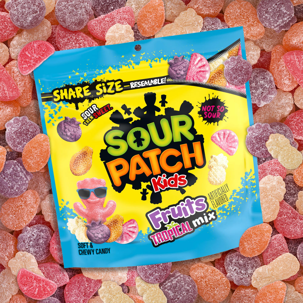 Sour Patch Kids Fruits Tropical Mix paradise punch flavor in a candy bowl.