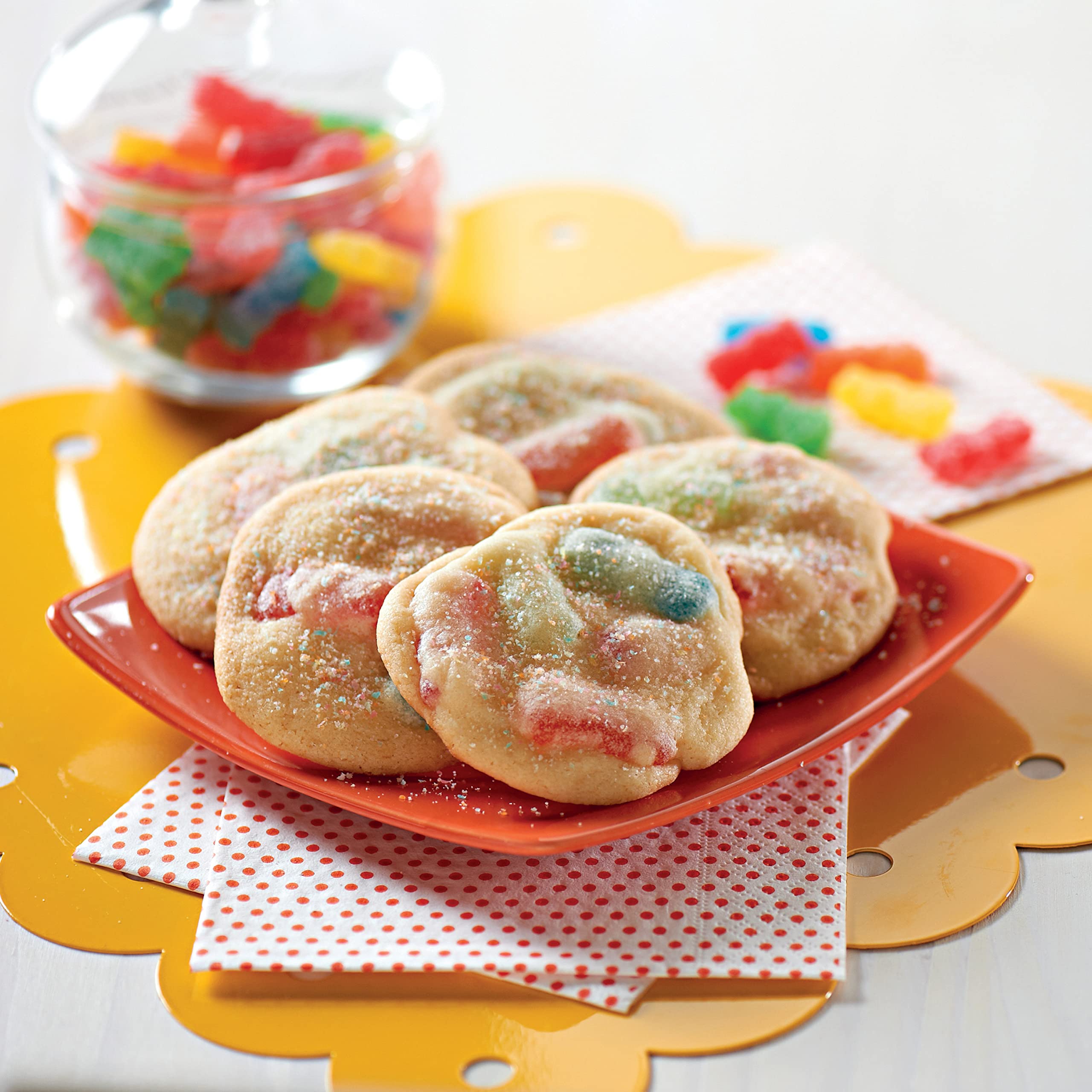 Sour Patch Kids pour into a bowl for movie night snacks.