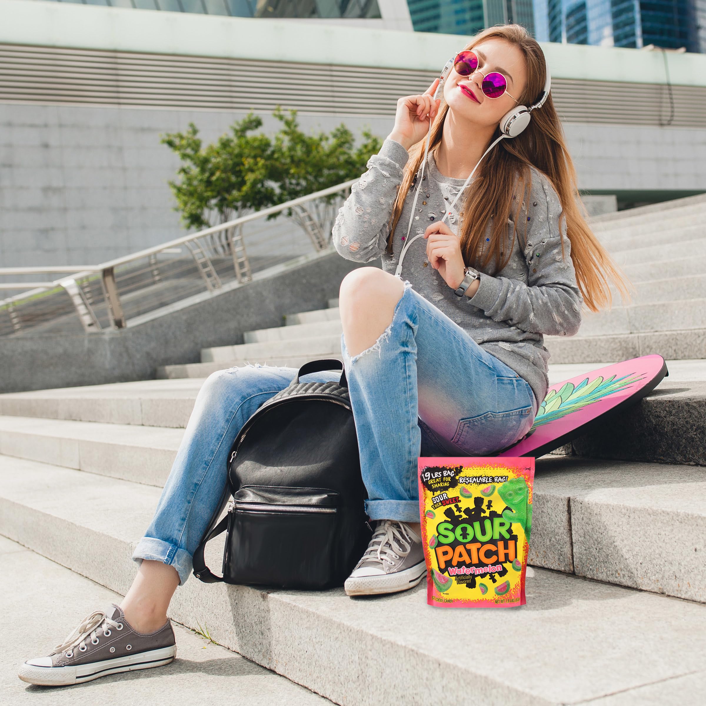 Sour Patch Kids Watermelon candy on movie night plate implies easy serving.