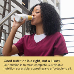 Soylent Banana ready-to-drink glass with straw illustrating quick meal replacement.