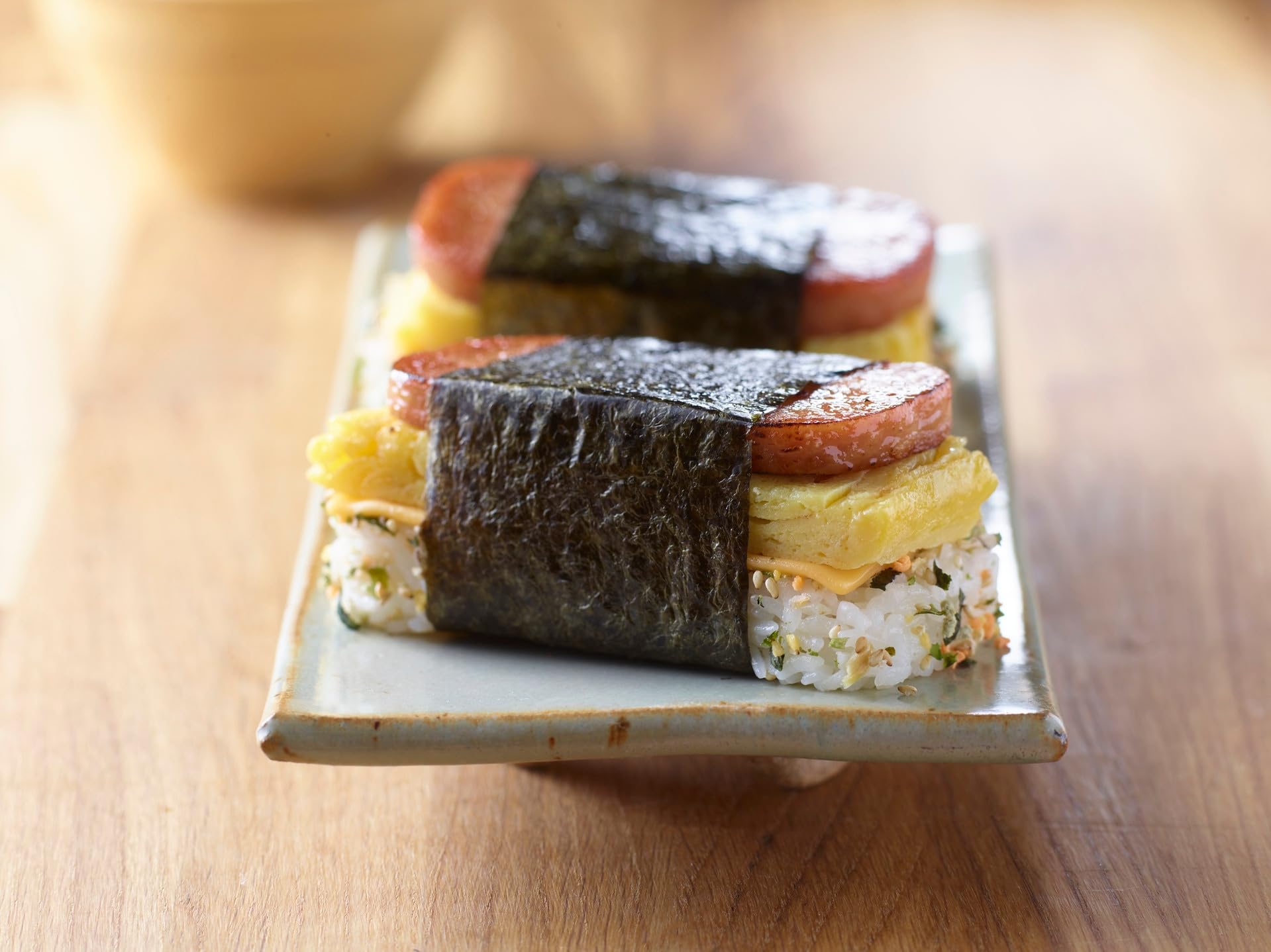 SPAM Classic sliced on plate, savory texture for breakfast or lunch.