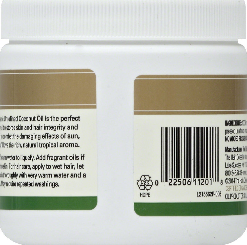 Spectrum Essentials Organic Coconut Oil texture close-up showing rich unrefined quality for hair care.