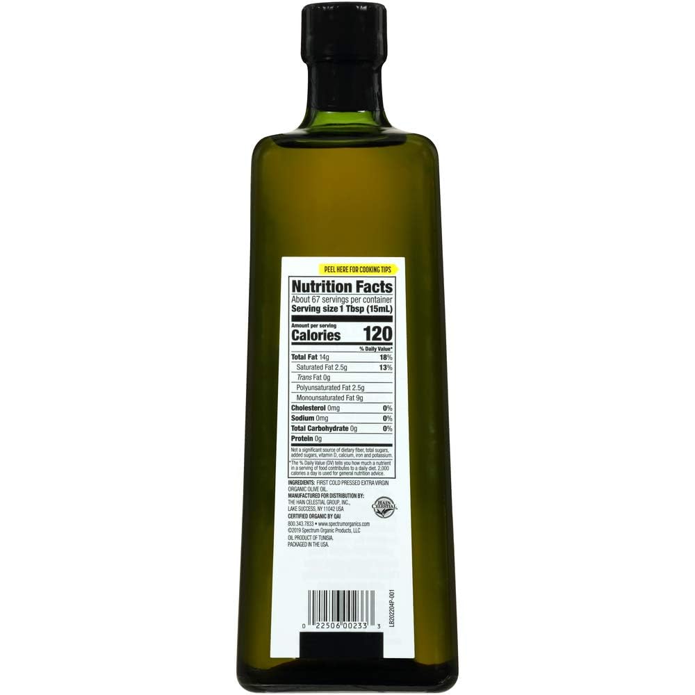 Drizzle of Spectrum Organic Mediterranean Olive Oil over salad with lemon brightness.