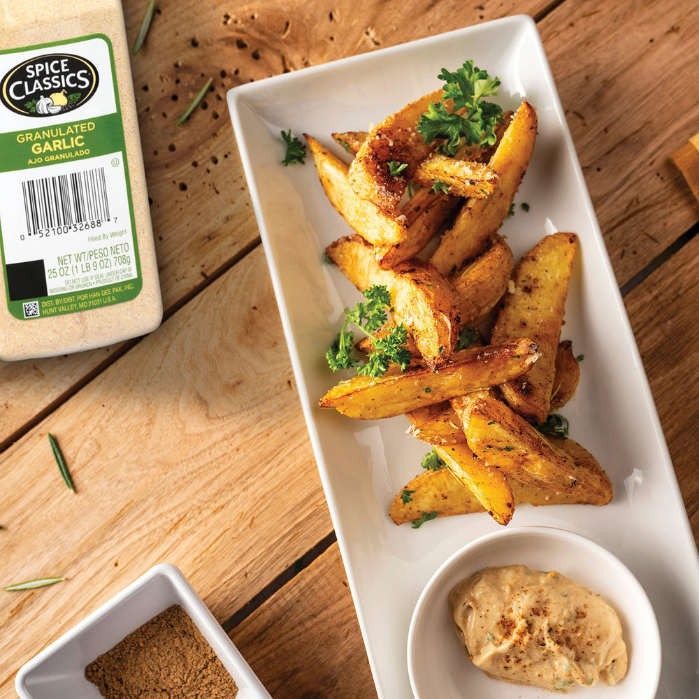 Spice Classics Granulated Garlic over roasted potatoes delivering bold aroma