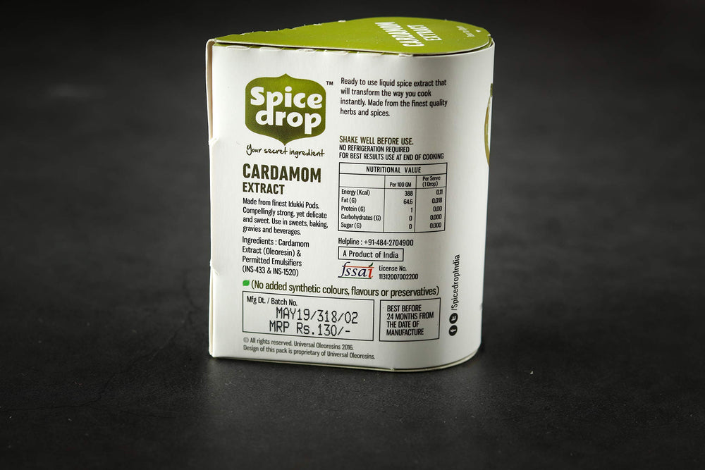 Spice Drop Cardamom Extract poured into coffee for bold flavor.