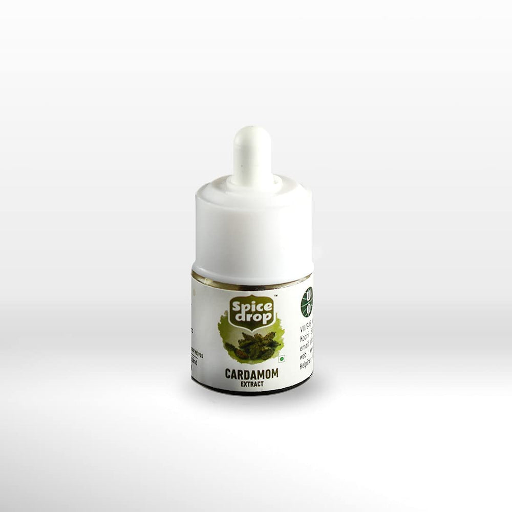 Spice Drop Cardamom Extract in a tea cup releasing fragrant notes.