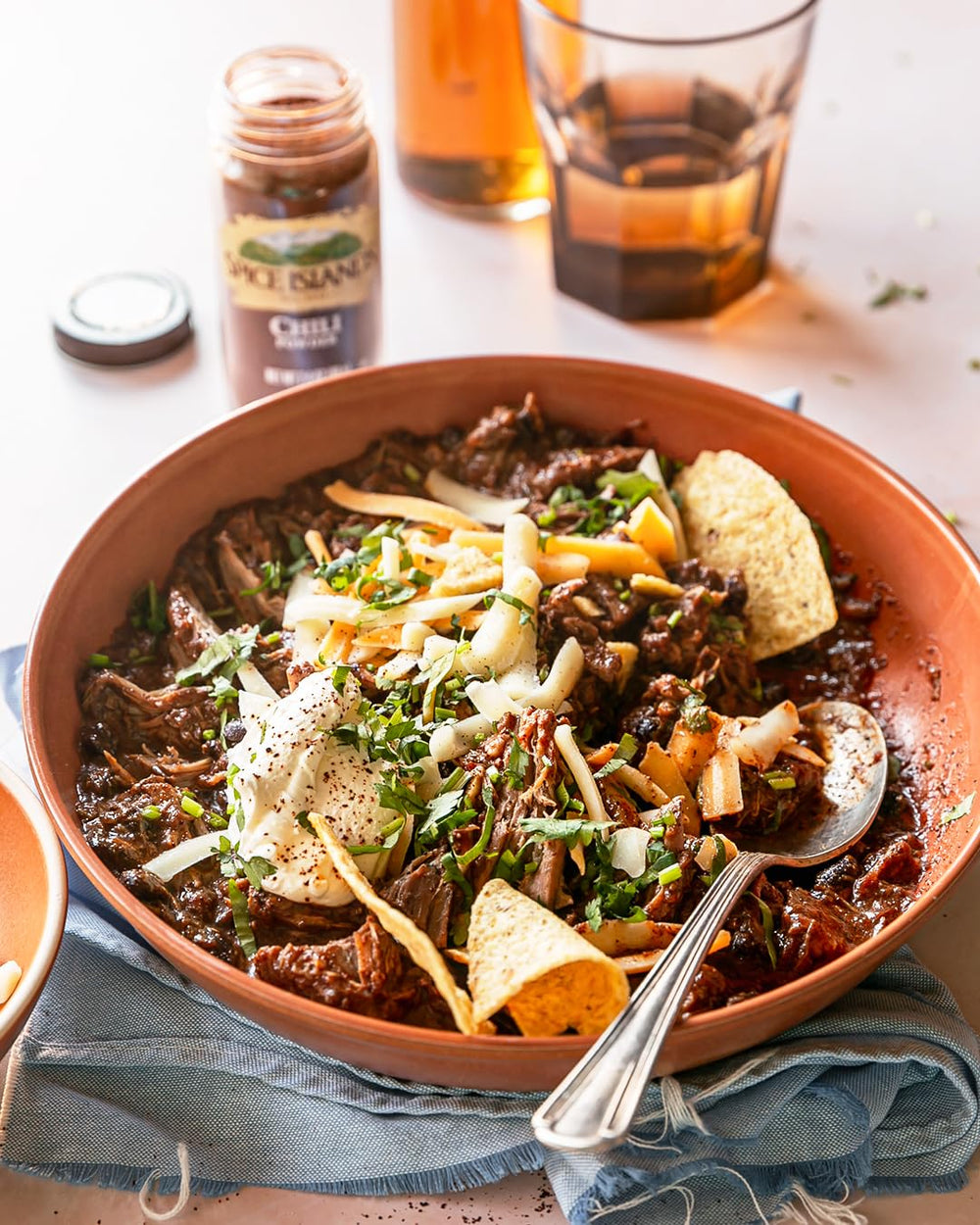 Spice Islands Chili Powder in a cozy kitchen scene for versatile weeknight flavor.