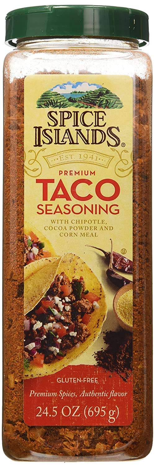 Spice Islands Premium Taco Seasoning bottle ready to flavor chicken, beef, or vegetables.