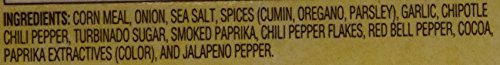 Spice Islands taco seasoning being sprinkled into pan for quick weeknight meals.