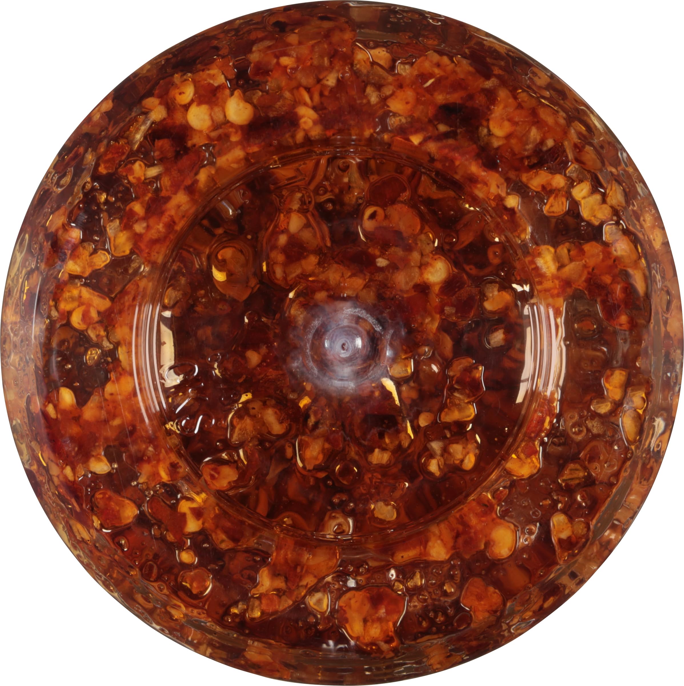 Bottle label of Spice World Chili Onion Crunch in a bright kitchen.
