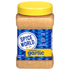 Spice World minced garlic jar on kitchen counter with ready-to-use flavor for quick meals.