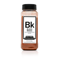 Spiceology Black Magic bottle pour showing salt-free Cajun flavor for grilling