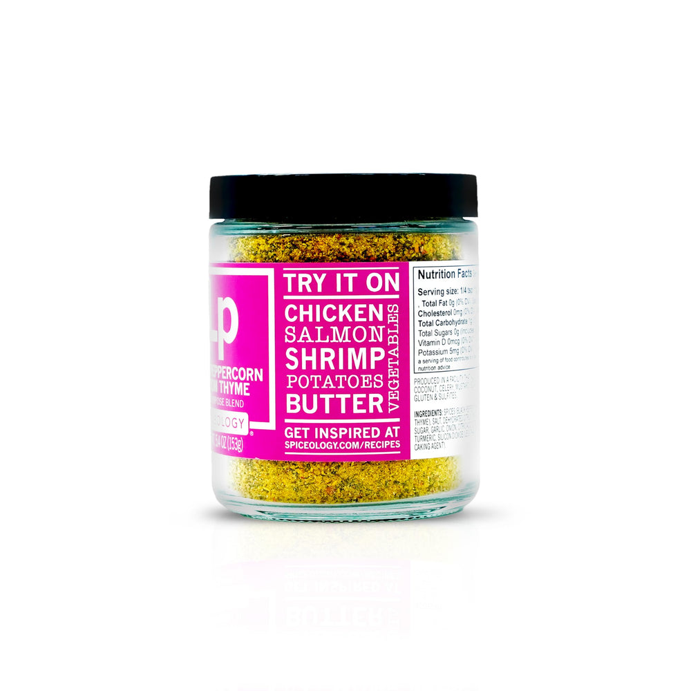 Glass jar of Spiceology Pink Peppercorn Lemon Thyme ready for use on kitchen counter