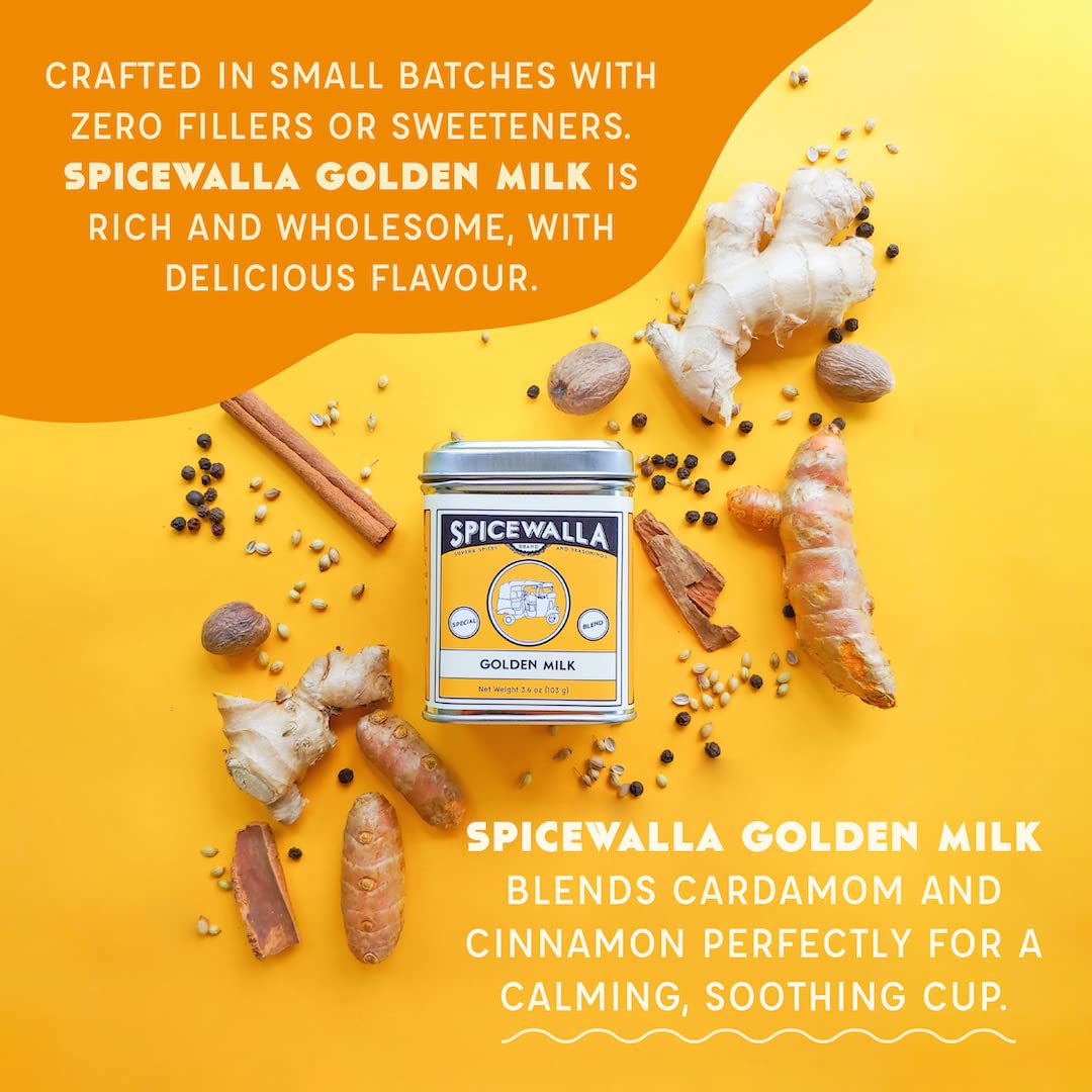 SPICEWALLA Golden Milk in a mug emits warm steam and inviting aroma.