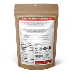 Ground texture of SPICY ORGANIC Red Chili Powder ready to sprinkle.