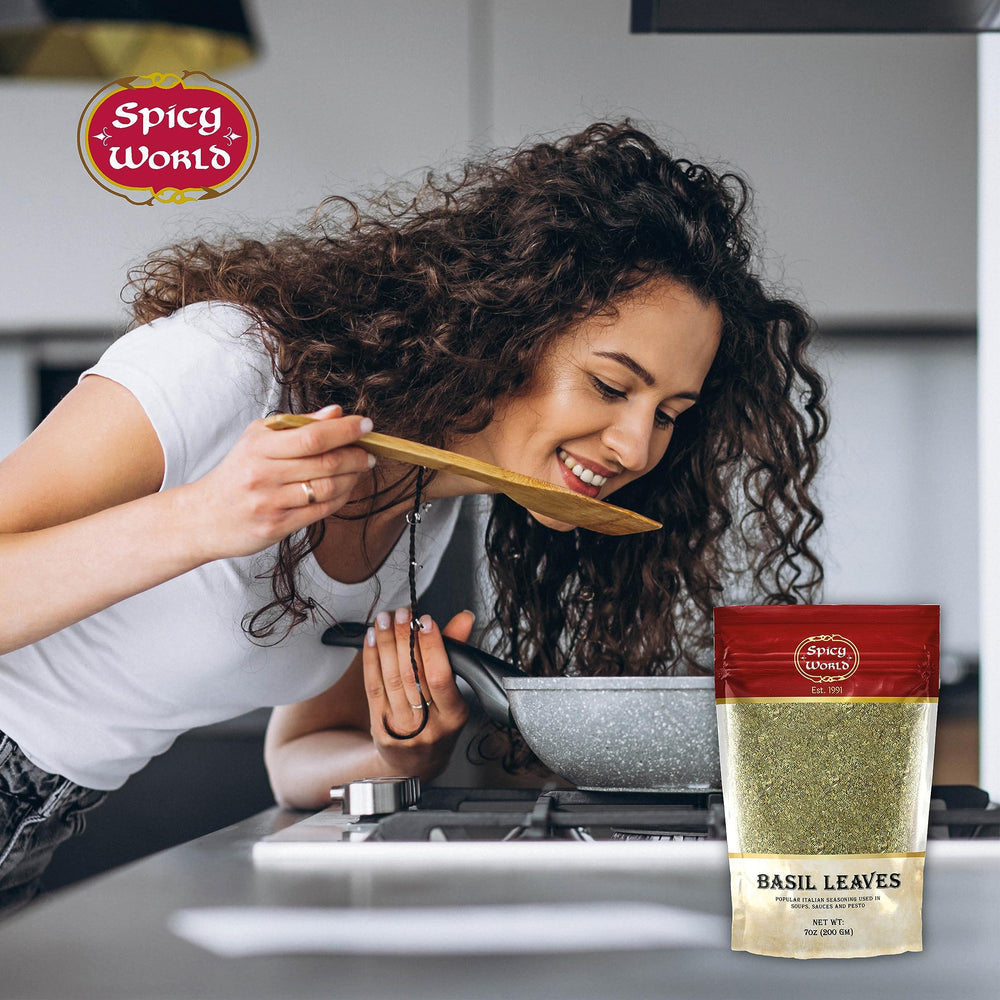 Spicy World dried basil leaves on spice shelf for everyday flavor.