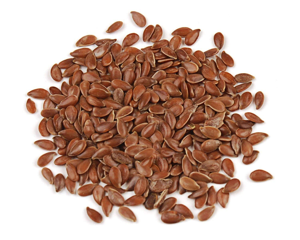 Spicy World brown flaxseed kitchen scene with measuring spoons.