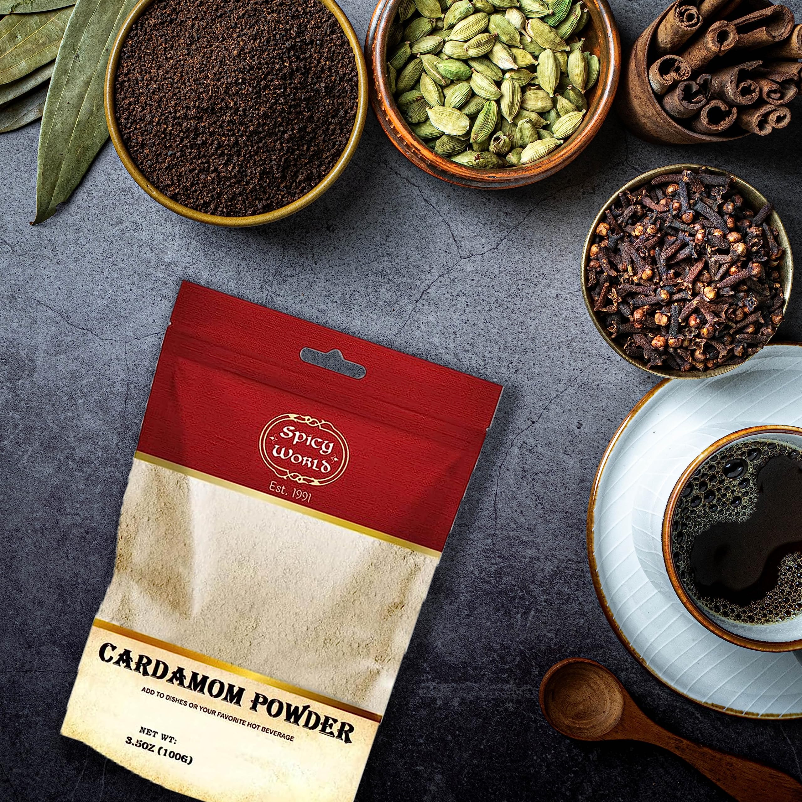 Spicy World ground cardamom with pods and powder in kitchen