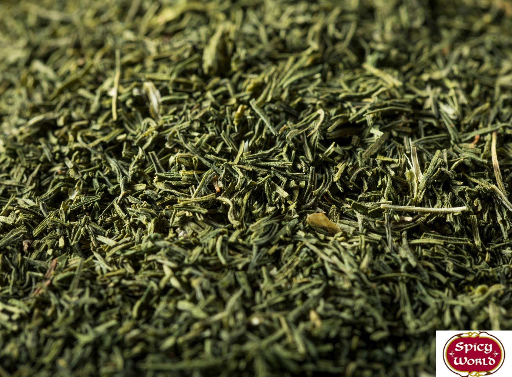 Open Spicy World dill weed bag with spoon, ready for quick seasoning.