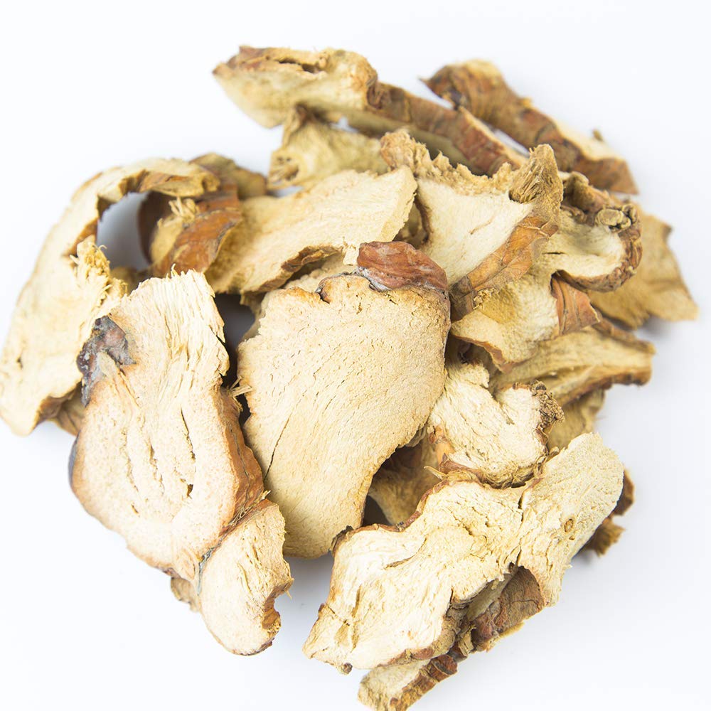 Galangal slices in a cooking bowl ready to simmer