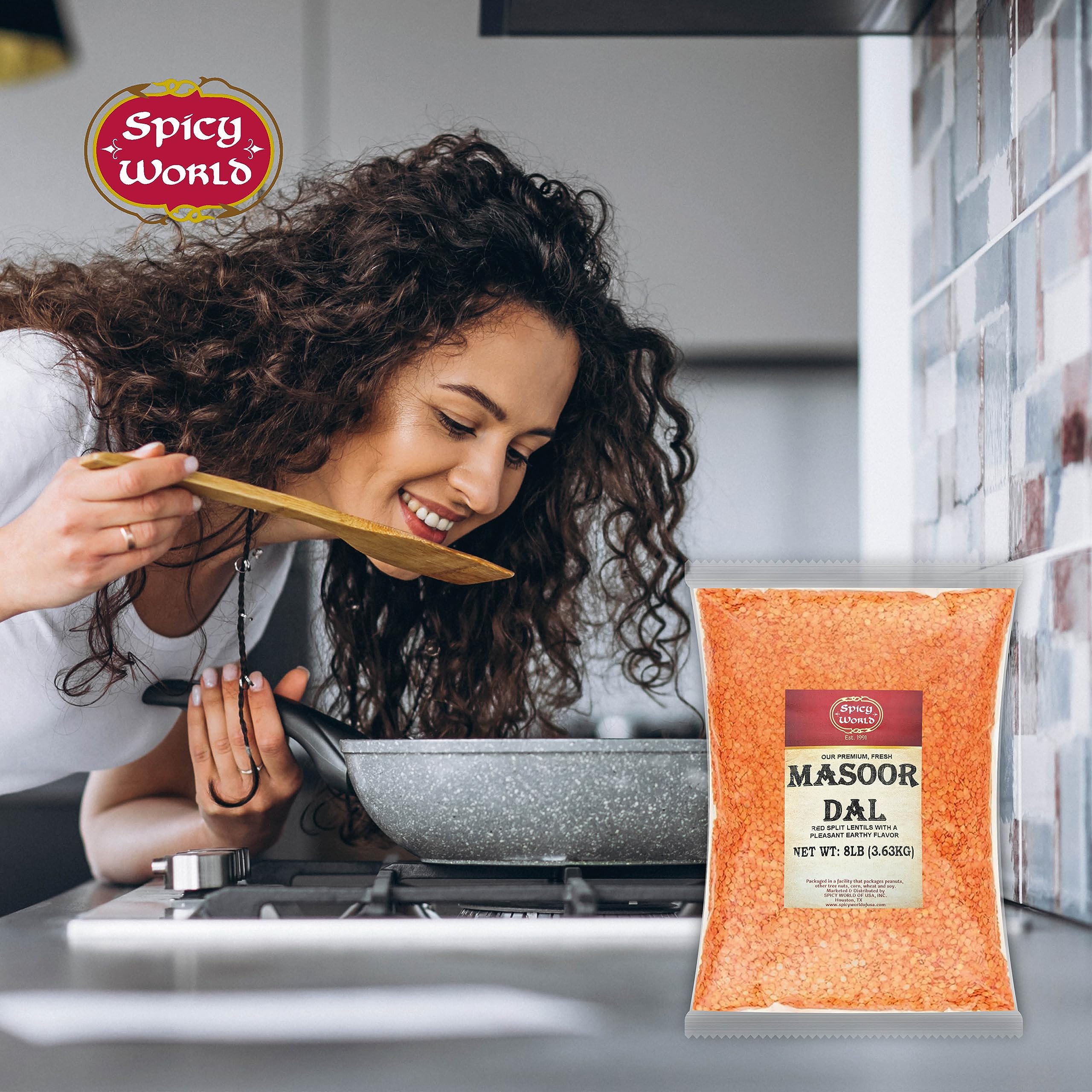Spicy World Masoor Dal served in a bowl with spices and rice.