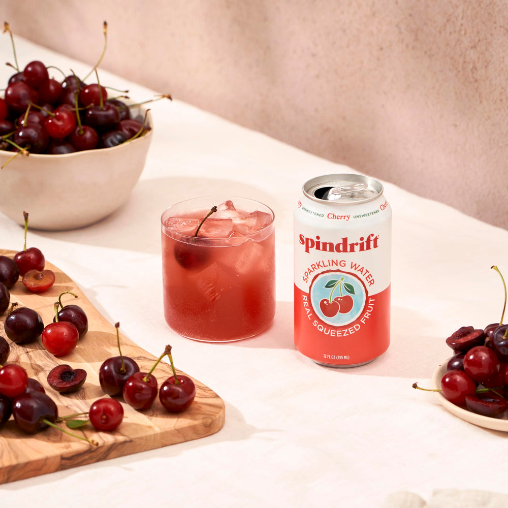 Taste-inspired scene suggests sipping Spindrift Cherry as a refreshing treat.
