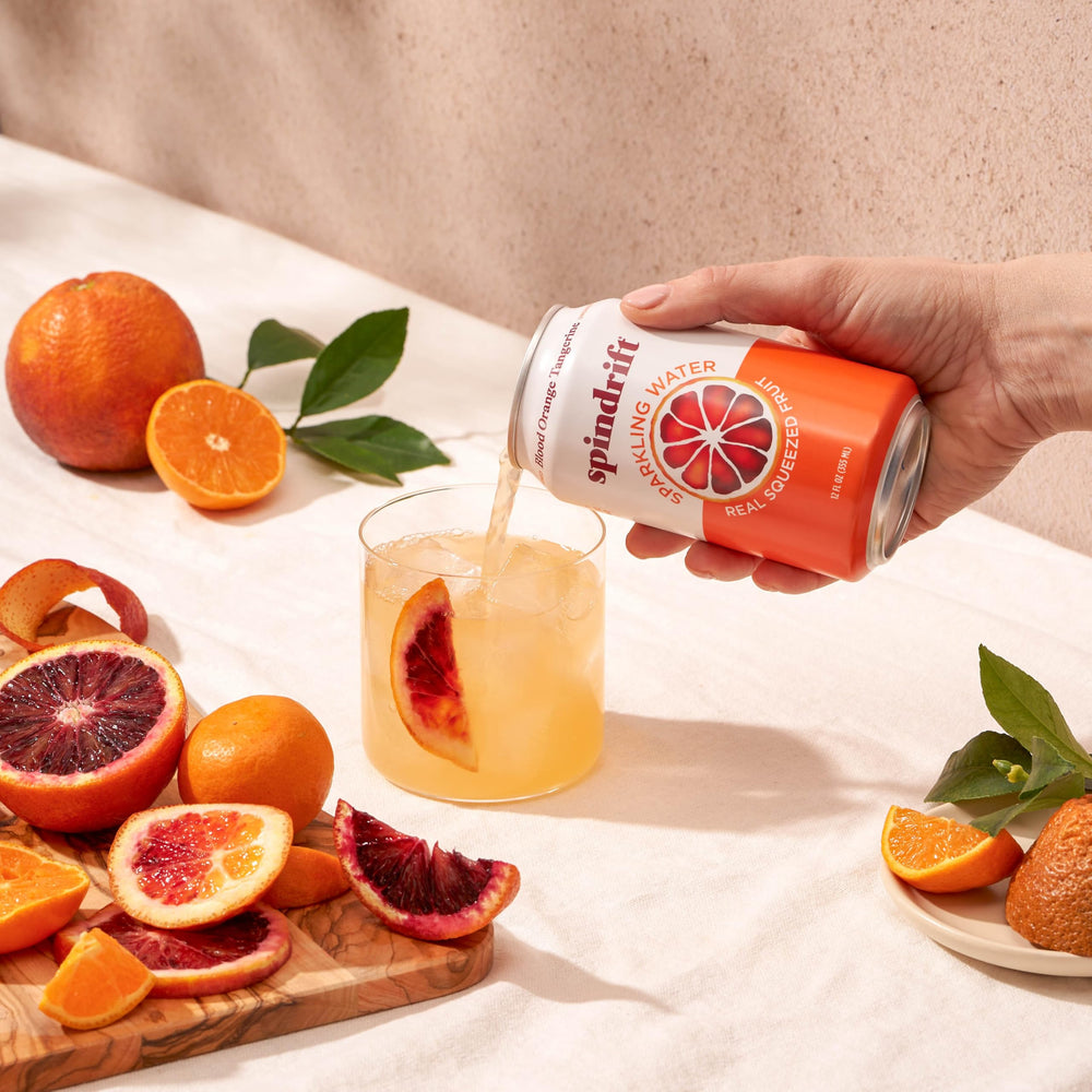 Close-up of the 8% fruit juice label on a Spindrift can.