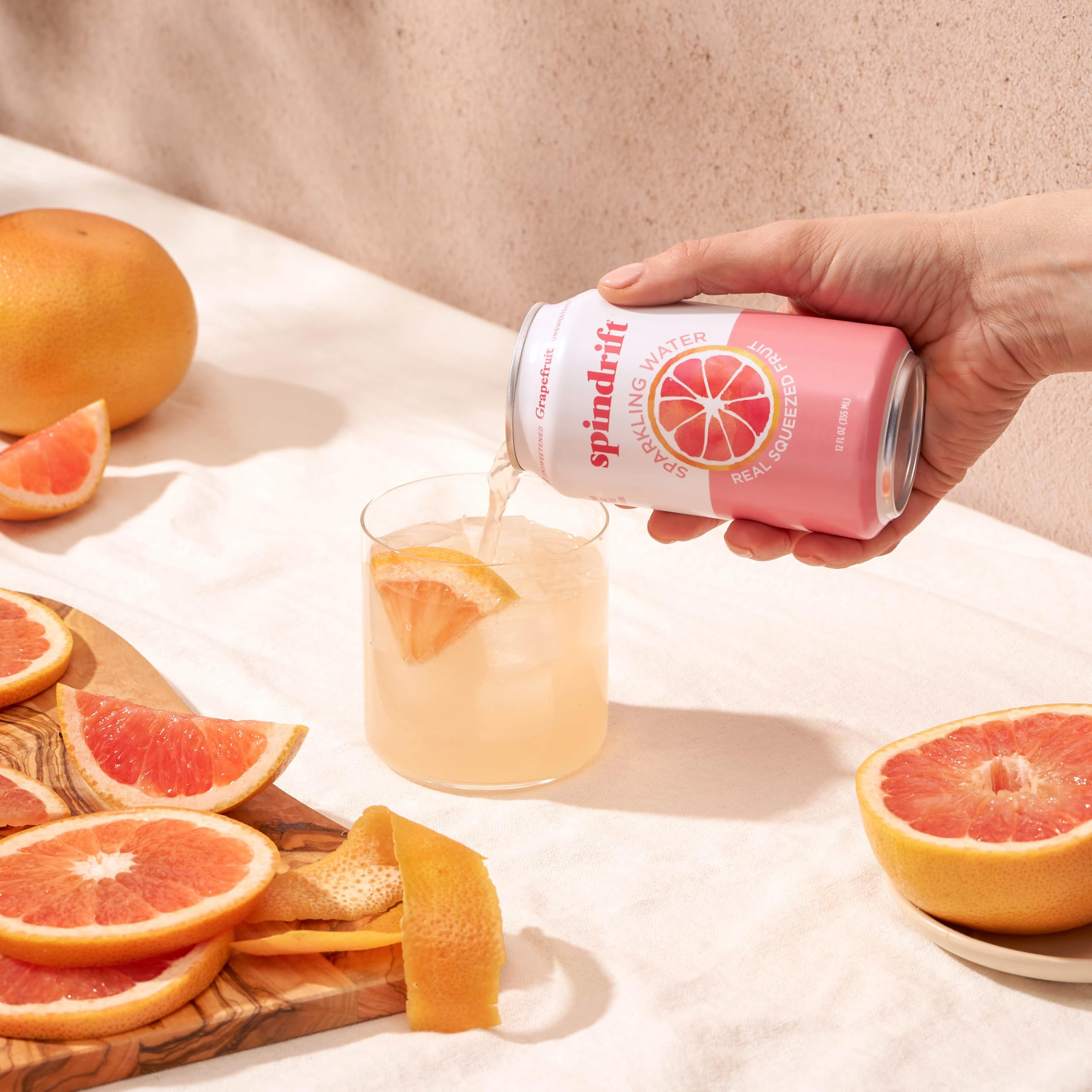 Chilled Spindrift Grapefruit can on ice evokes crisp grapefruit aroma.