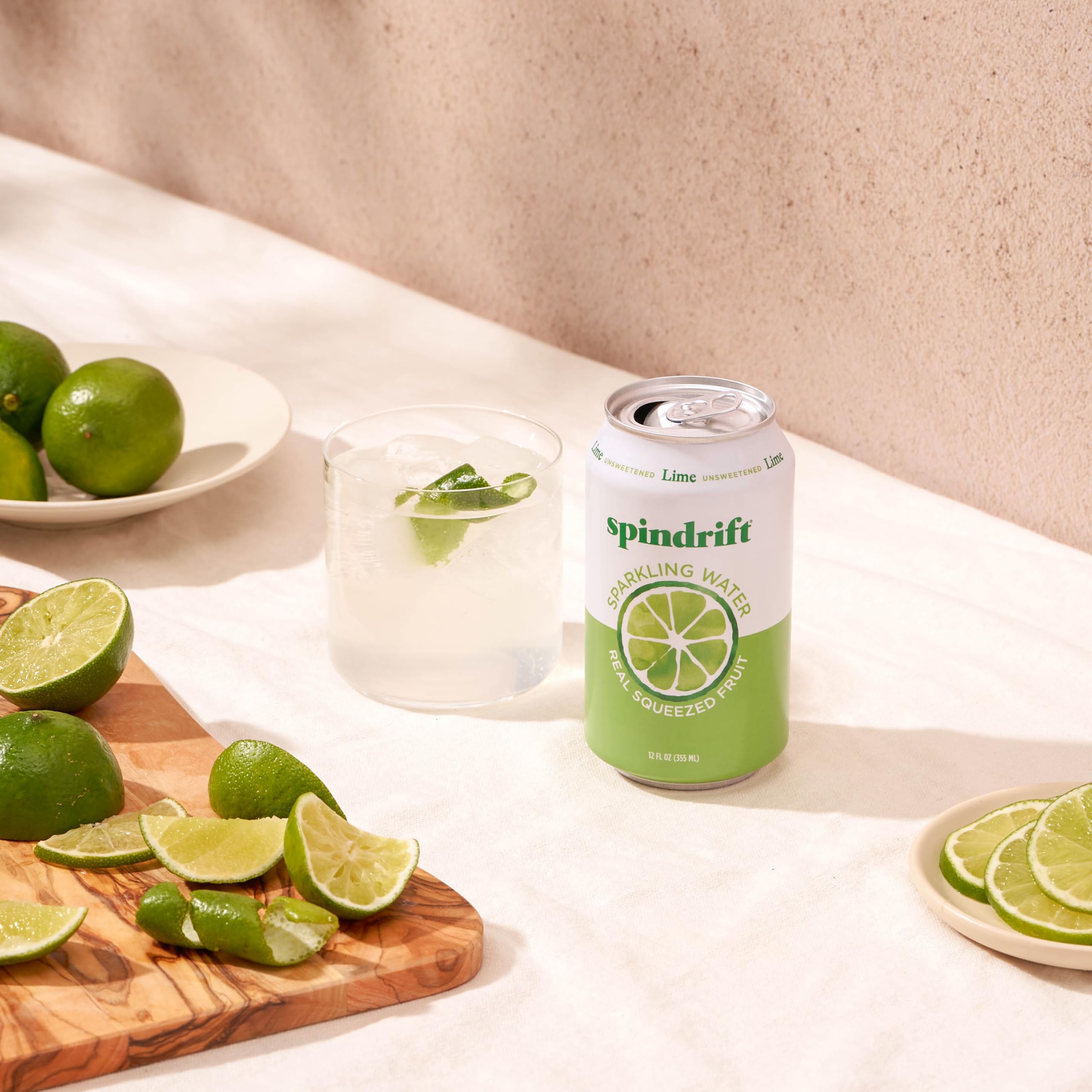Spindrift lime can pair on table, ready to sip.