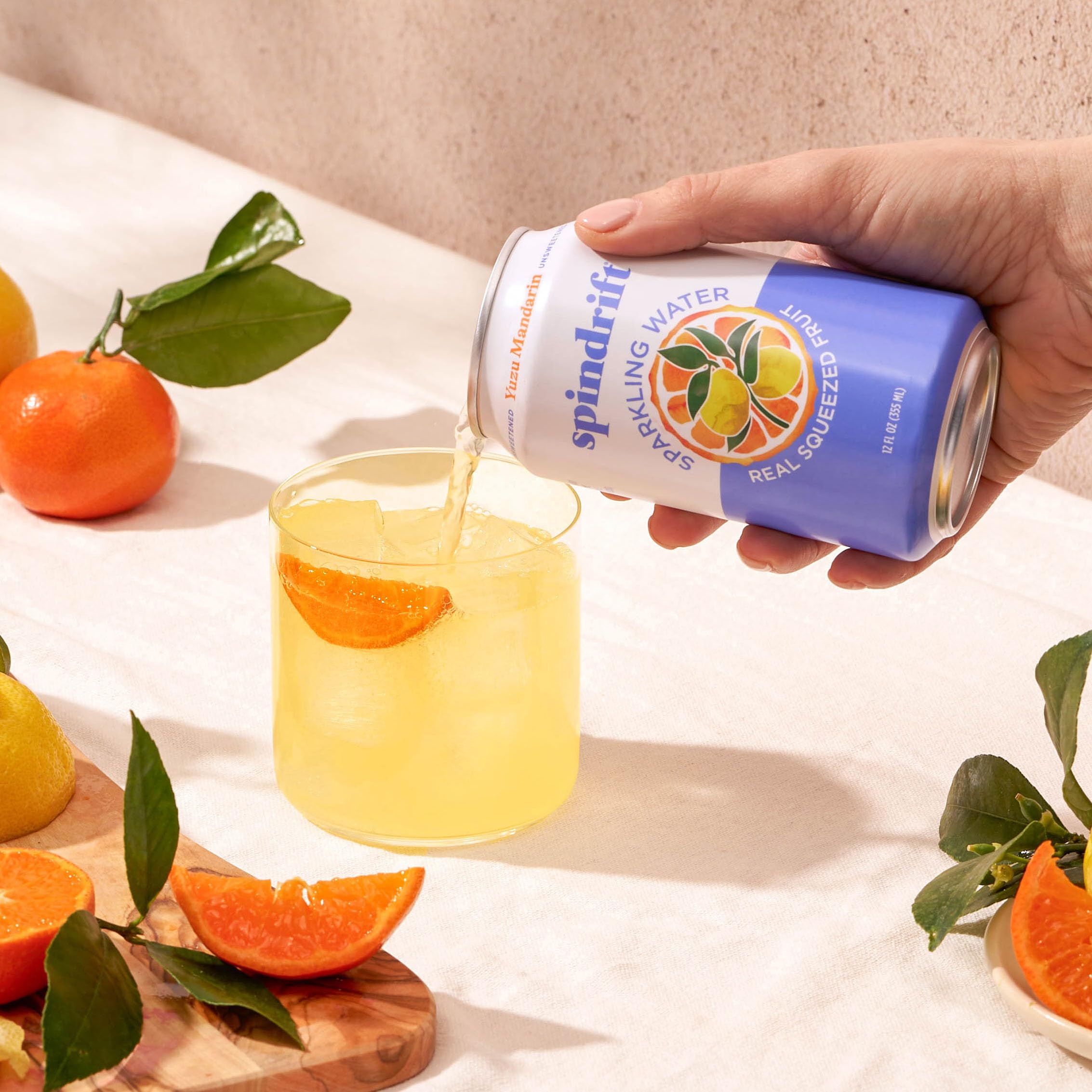 Display of 24-pack Spindrift Yuzu Mandarin cans for gatherings