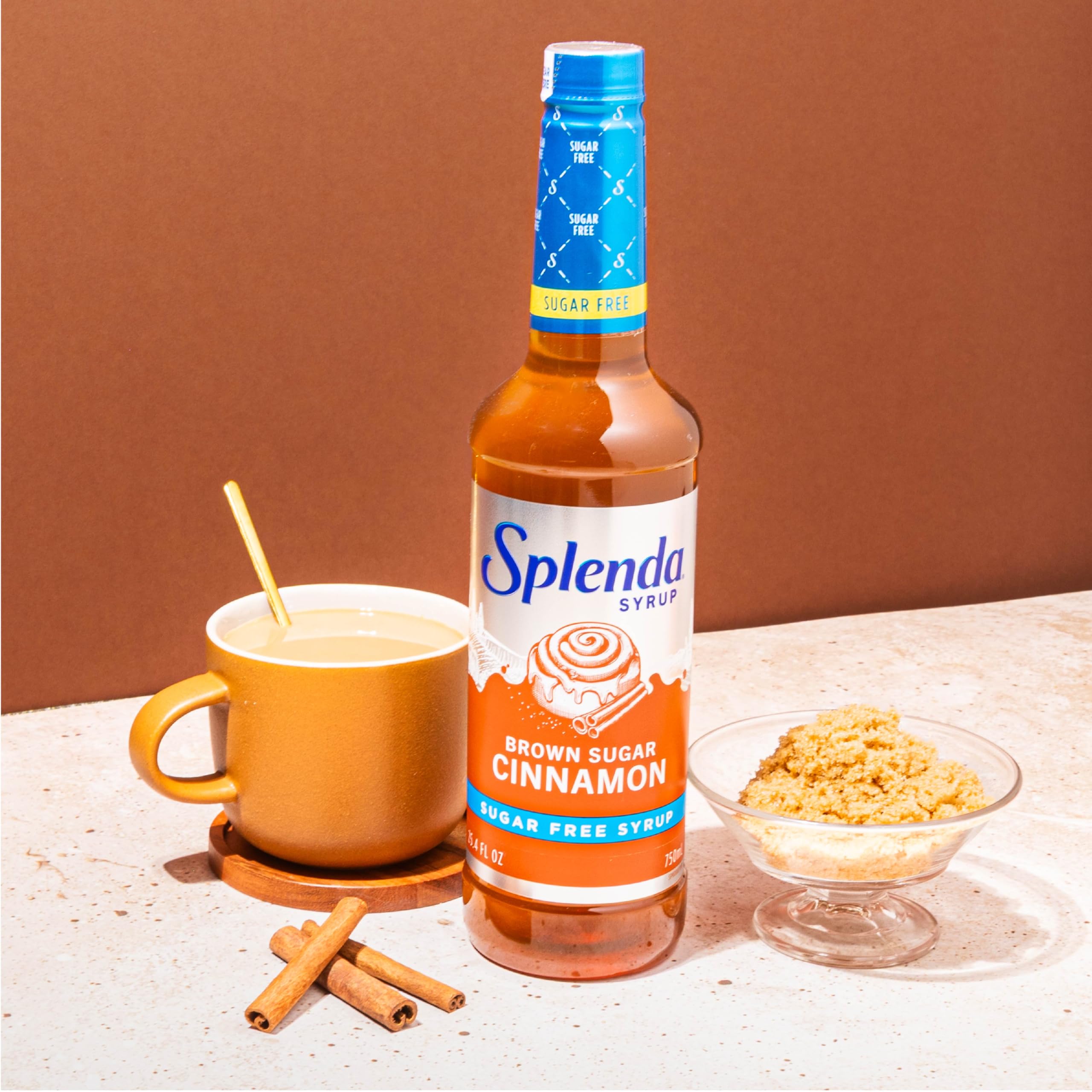 Splenda Coffee Syrup bottle beside mug for cafe-style beverages