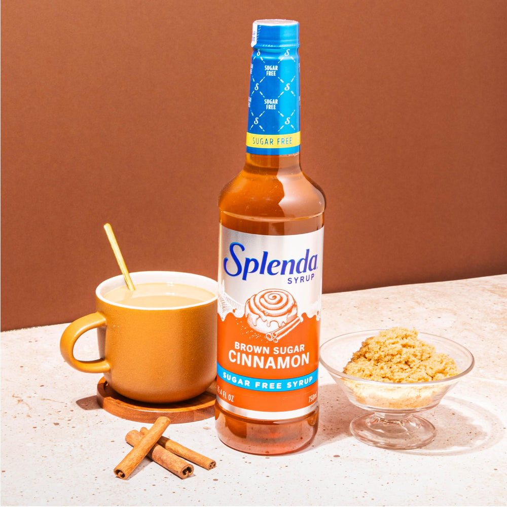 Splenda Coffee Syrup bottle beside mug for cafe-style beverages