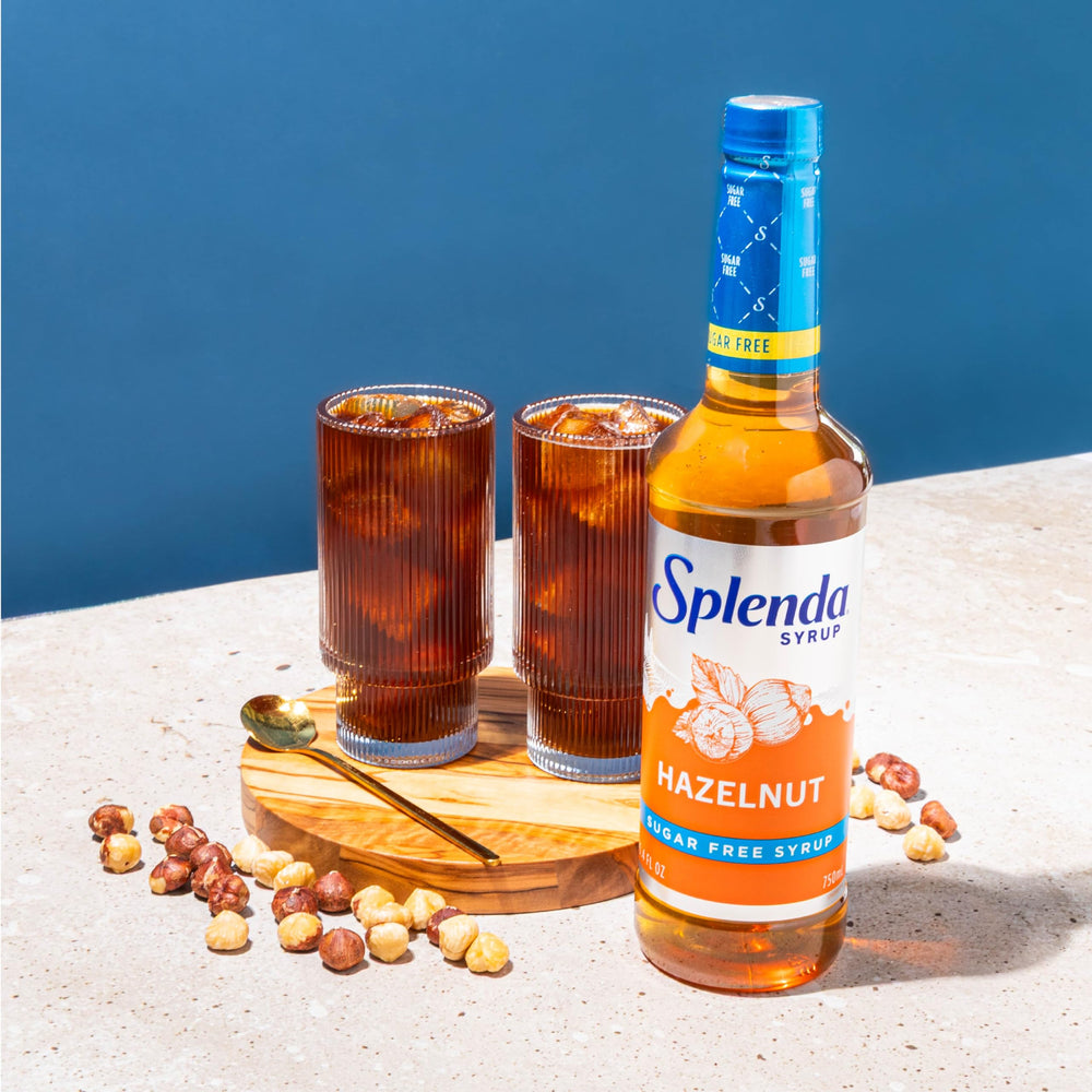 SPLENDA Hazelnut Coffee Syrup dispenser bottle for quick, sugar-free customization.