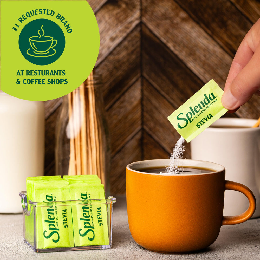 SPLENDA Stevia granulated powder being poured into a cup for drinks.