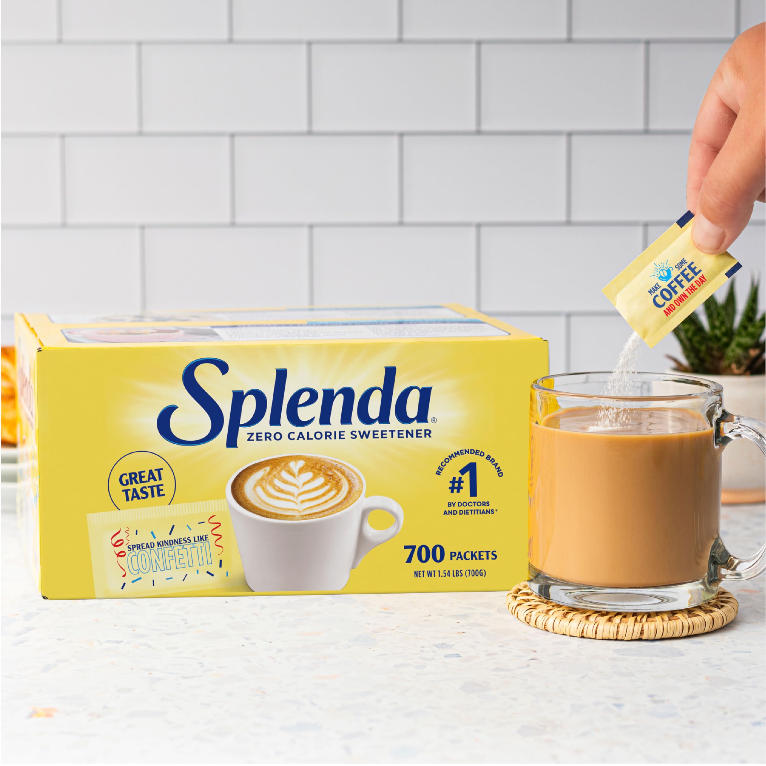 SPLENDA Zero Calorie packets poured into a cup for instant sweetness.