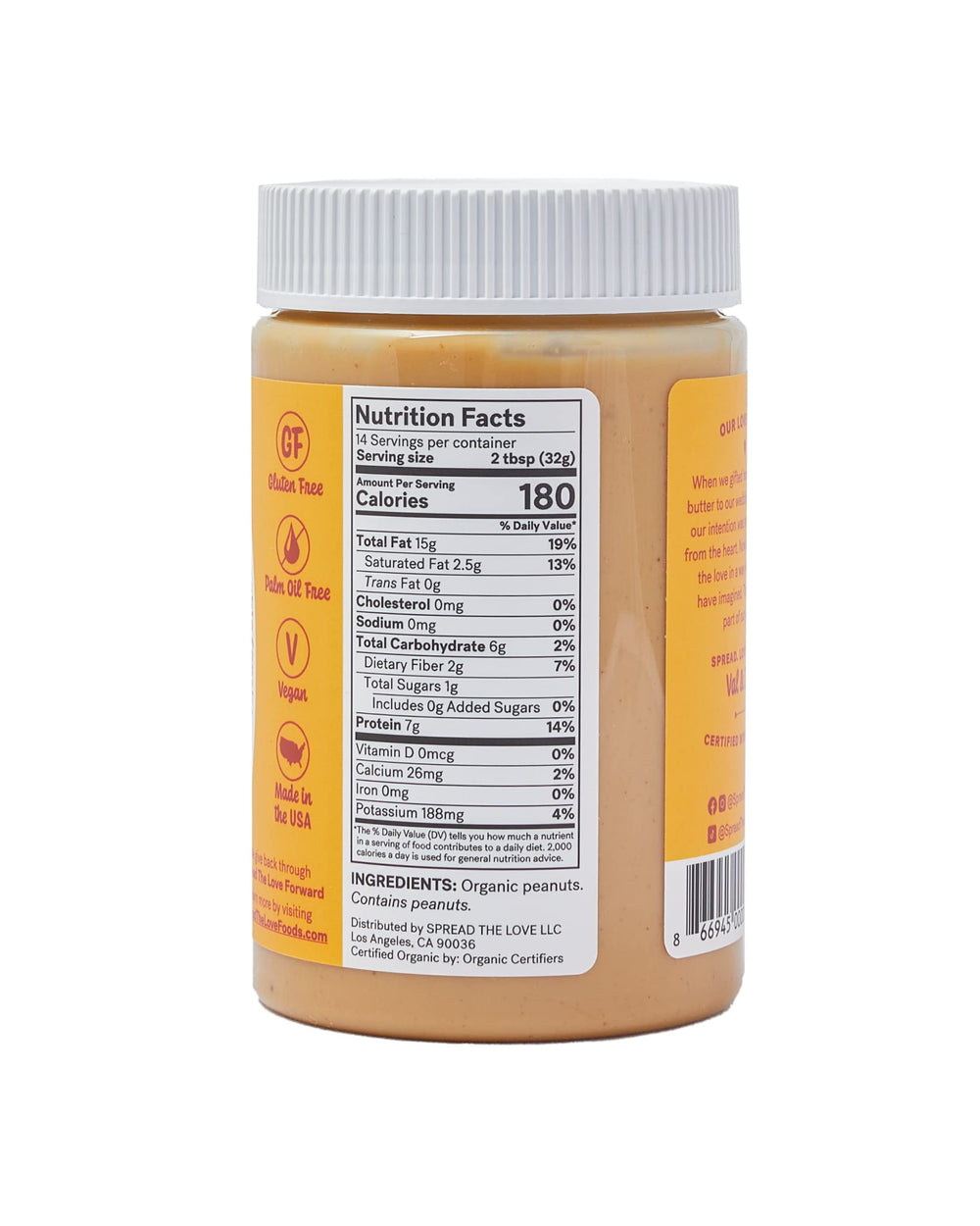 Creamy texture of Spread The Love Naked Organic Peanut Butter held on a spoon