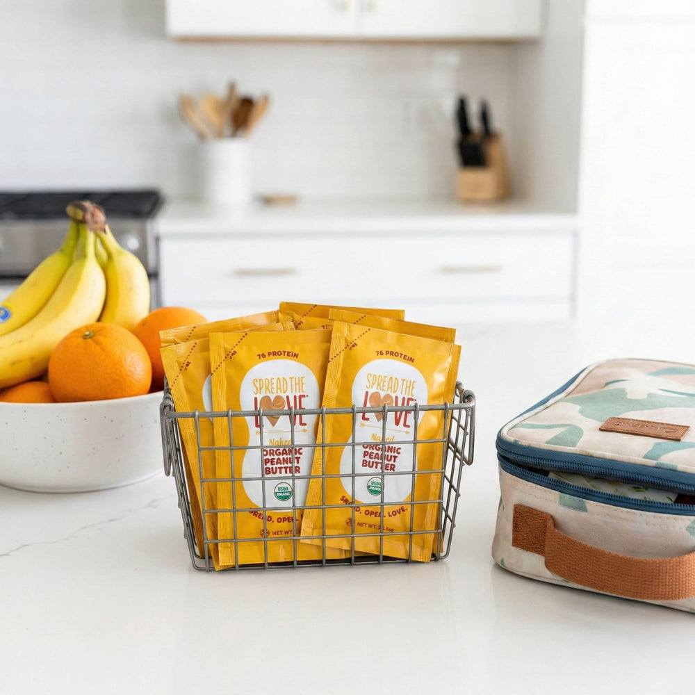 Spread The Love NAKED squeeze pack on road trip, convenient snacking.