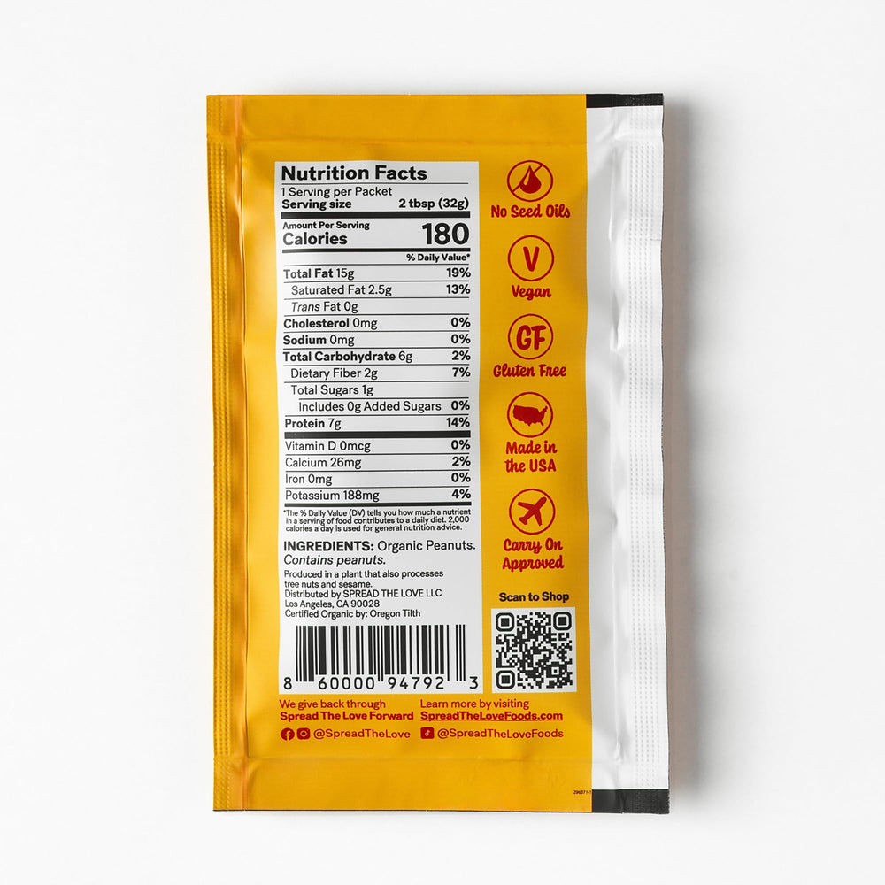 Spread The Love NAKED squeeze pack held in hand, portable workout fuel.