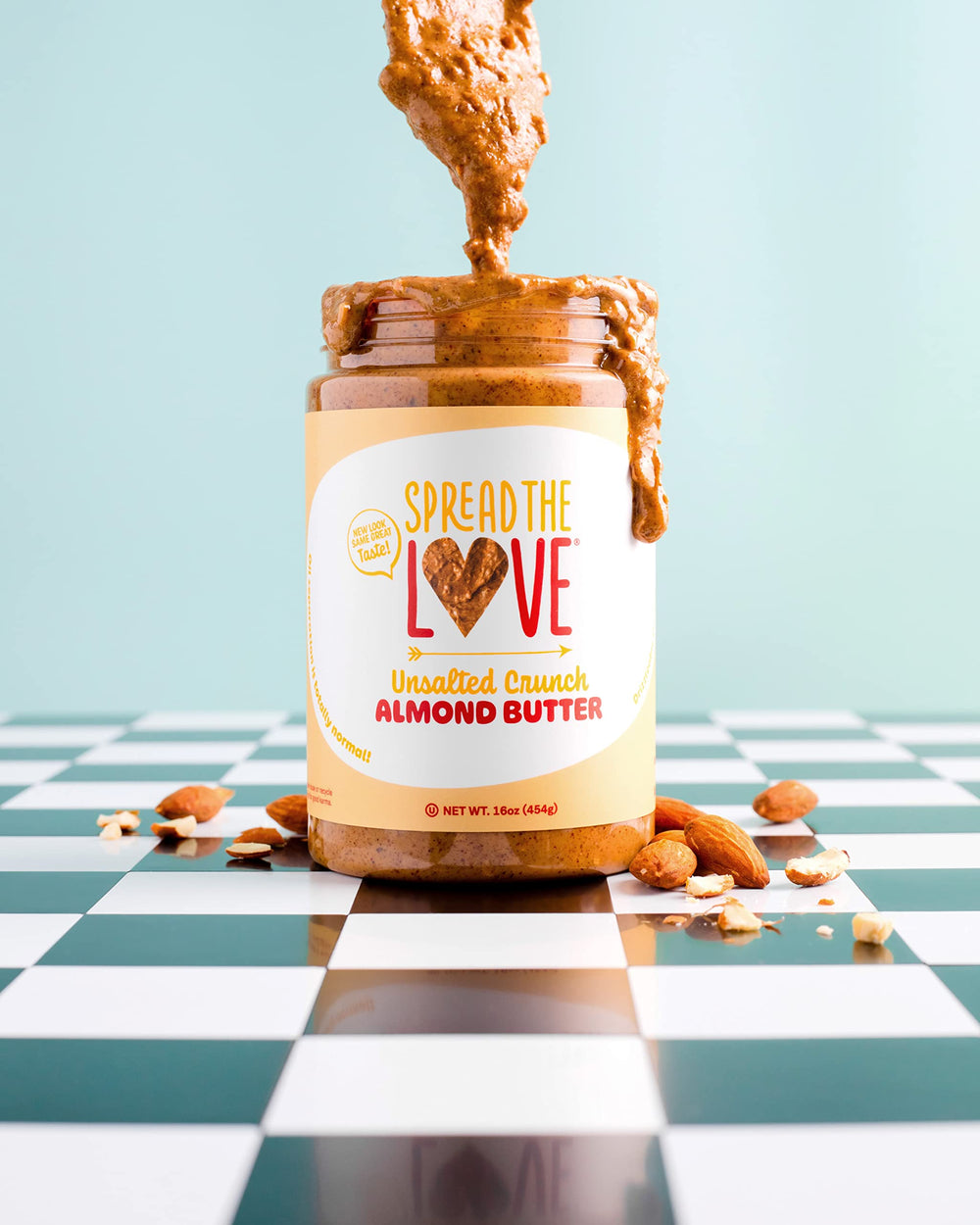 Spread The Love almond butter used as a dessert topping on brownies or ice cream.