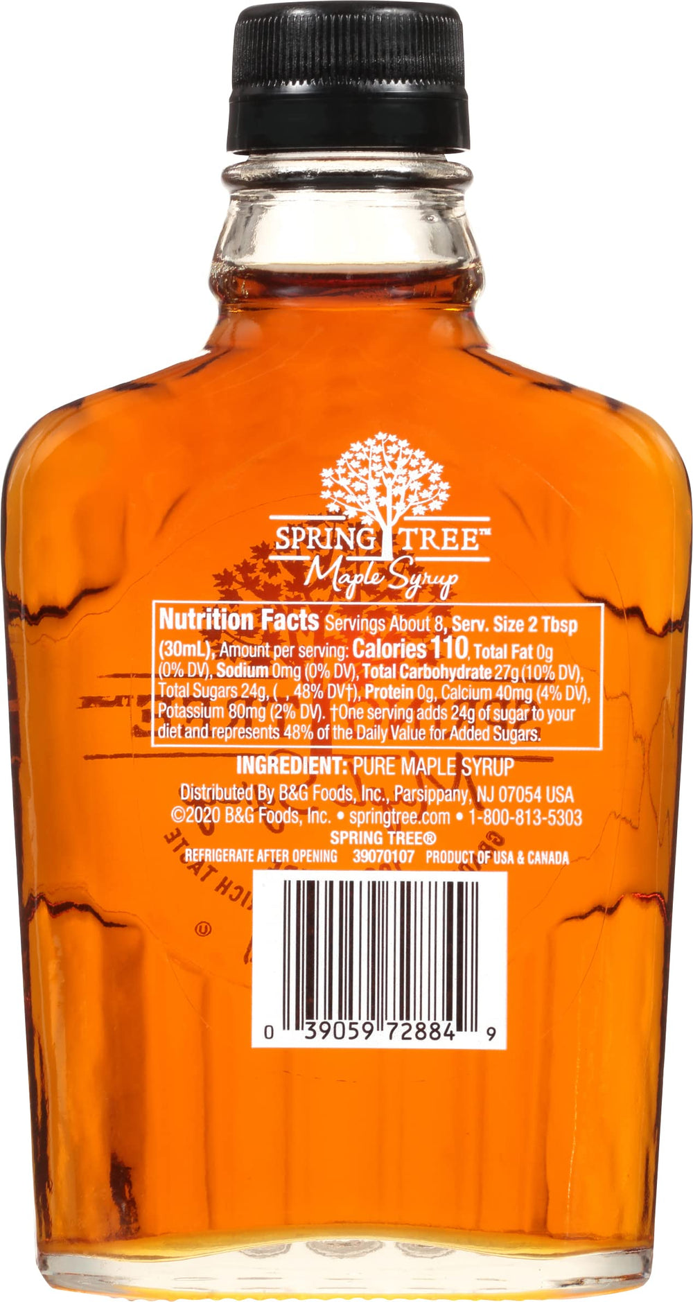 Spring Tree Organic Maple Syrup bottle’s amber hue on shelf