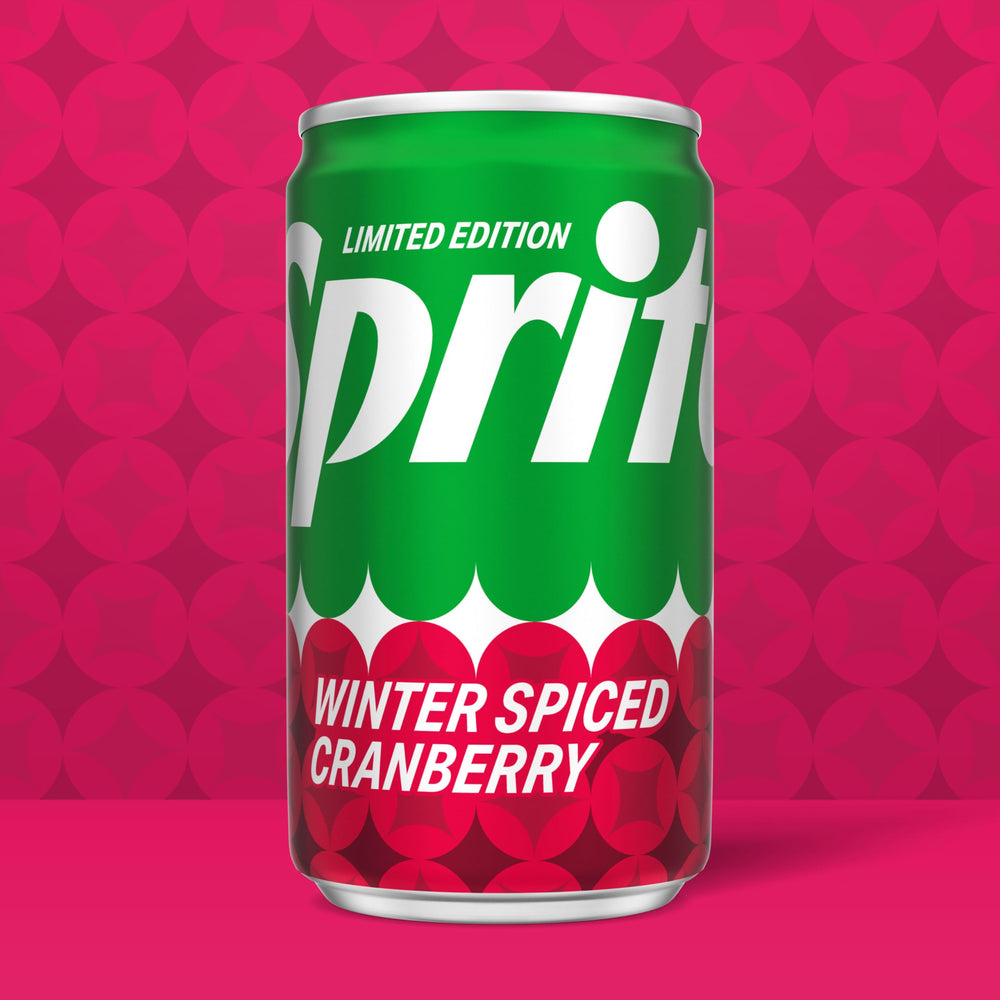 Pouring Sprite Winter Spiced Cranberry into a glass for a refreshing sip.